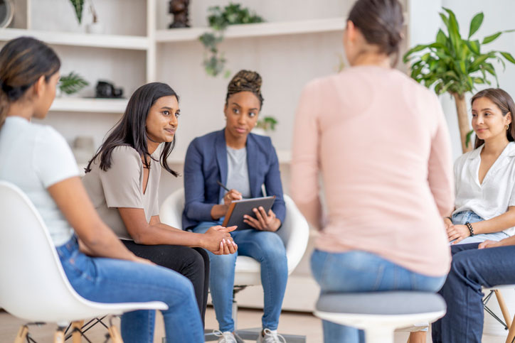 group therapy session for woman