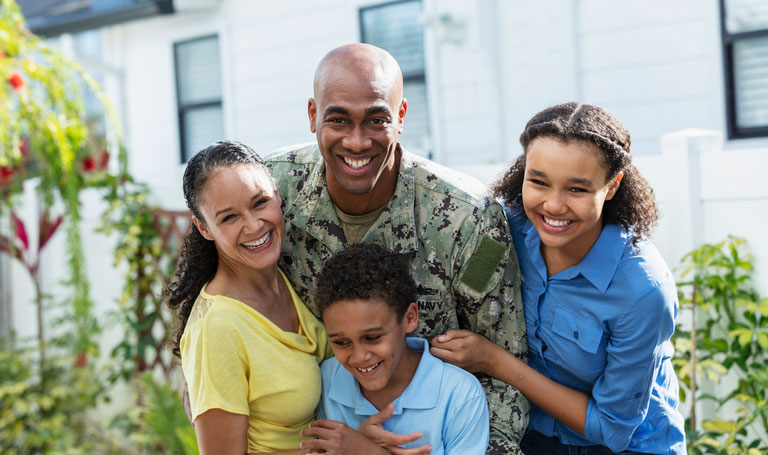 navy veteran with his family