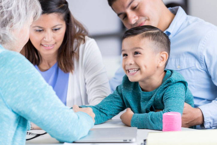 social worker helping family and young boy