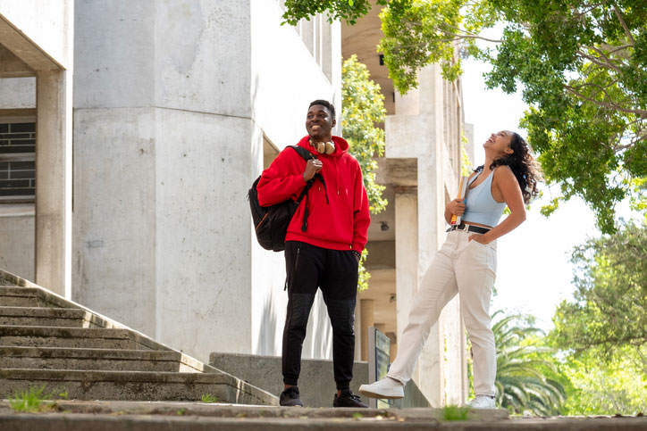 young college students on campus stairs