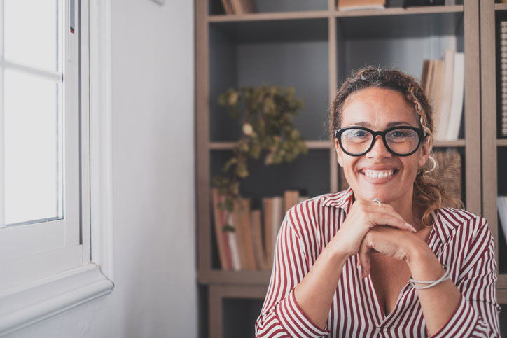 cheerful woman in her office