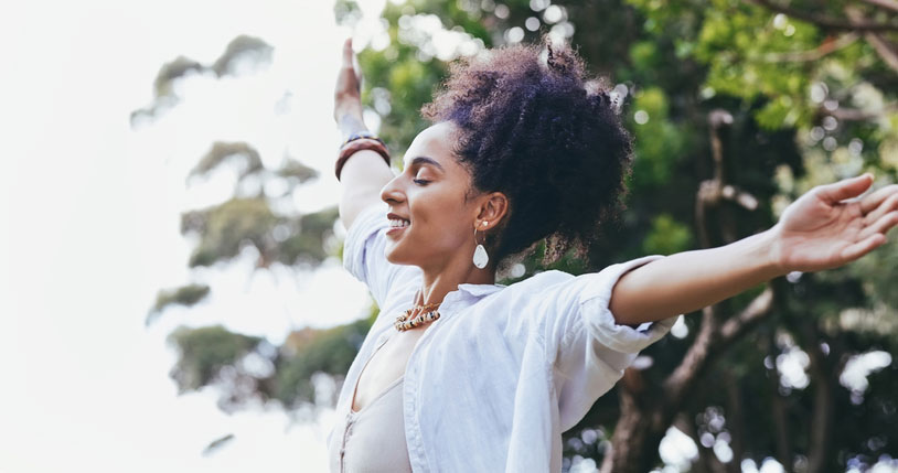 woman feeling free in nature