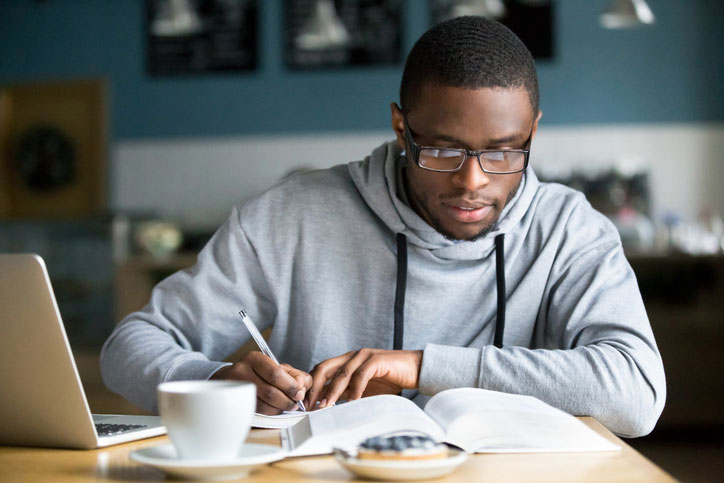 young man studying hard