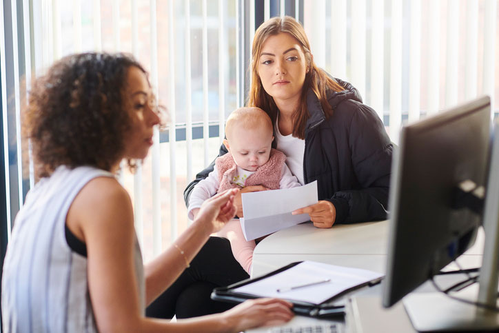 mom and infant getting help