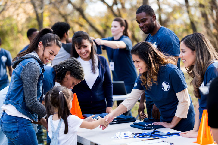 volunteers helping families