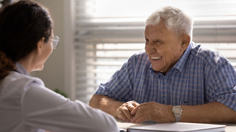 elderly couple laughing