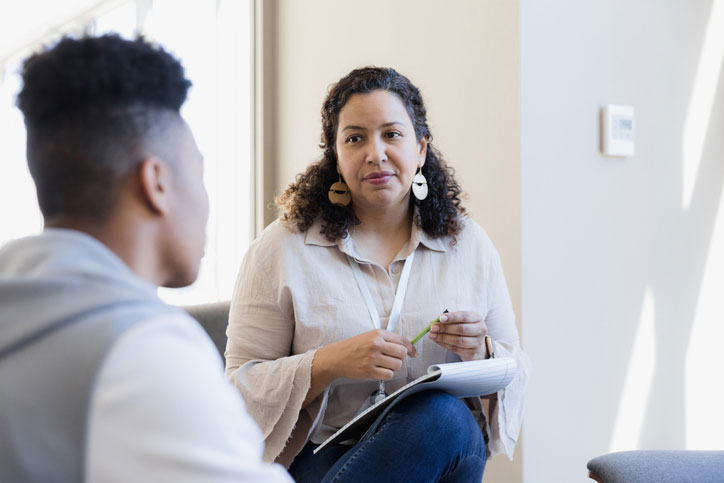 counselor listening to patient