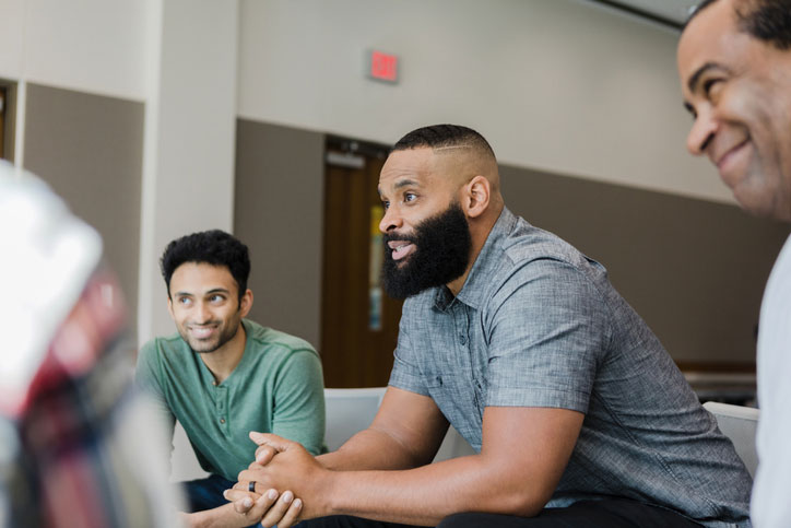 two guys talking things through