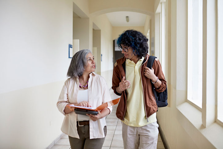 walking with teacher down the hall