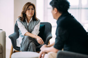 two people in intense conversation