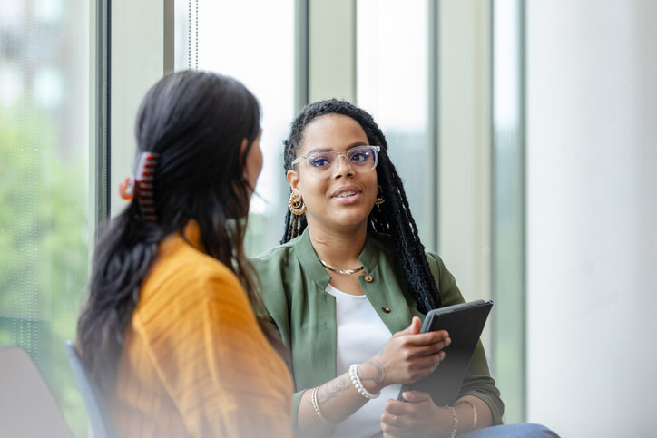 social worker listening attentively to patient