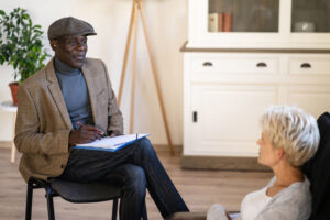 woman talking to male counselor