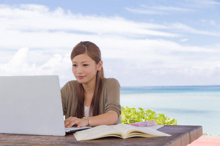 woman on laptop outside