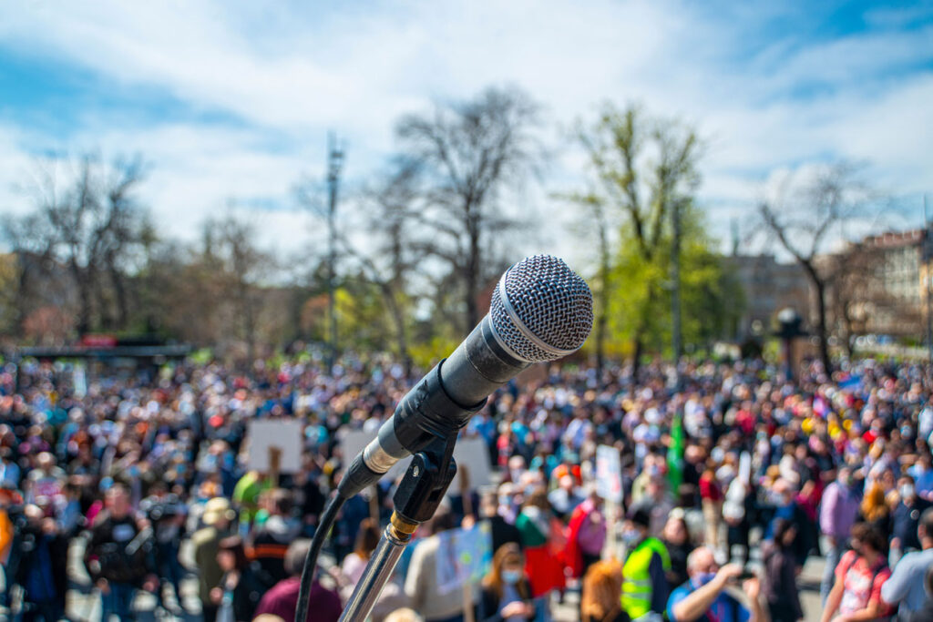 microphone addressing large crowd